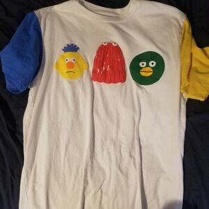 Hot Topic White Tee with Blue, Yellow, Red, and Green Accents